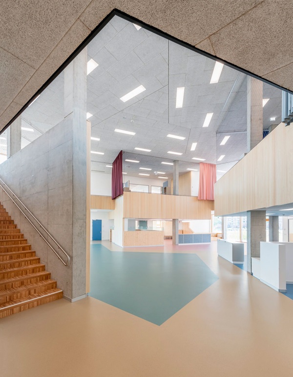 Bildungscampus Berresgasse, Wien: Das Konzept fasst Kindergartengruppen und Volksschulklassen in Bildungsbereiche zusammen