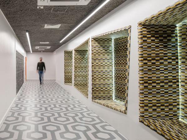 noraplan floor tiles provide aesthetics, acoustics and safety for the first school building developed under a motorway